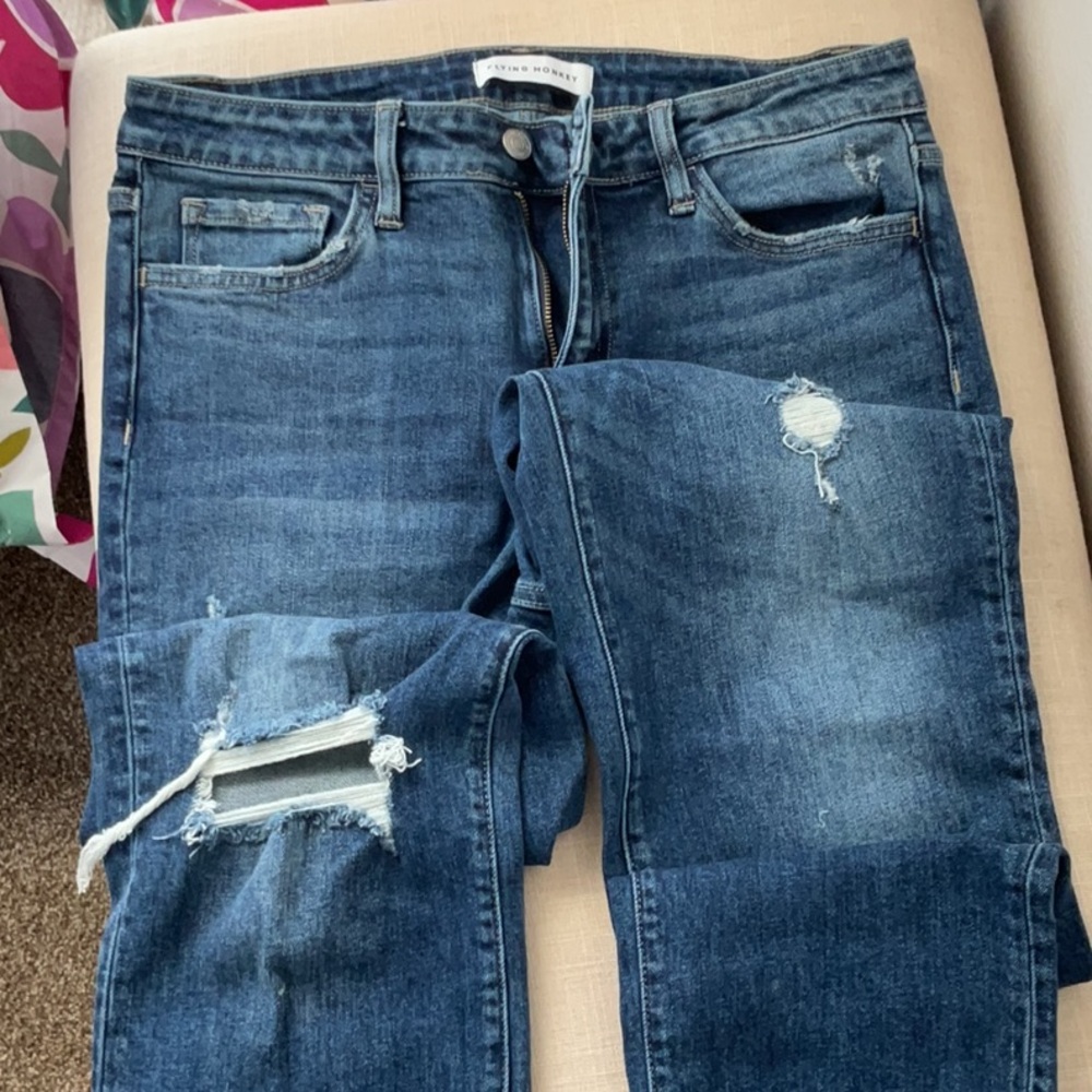 Women’s size 8 Flying Monkey distressed jeans.